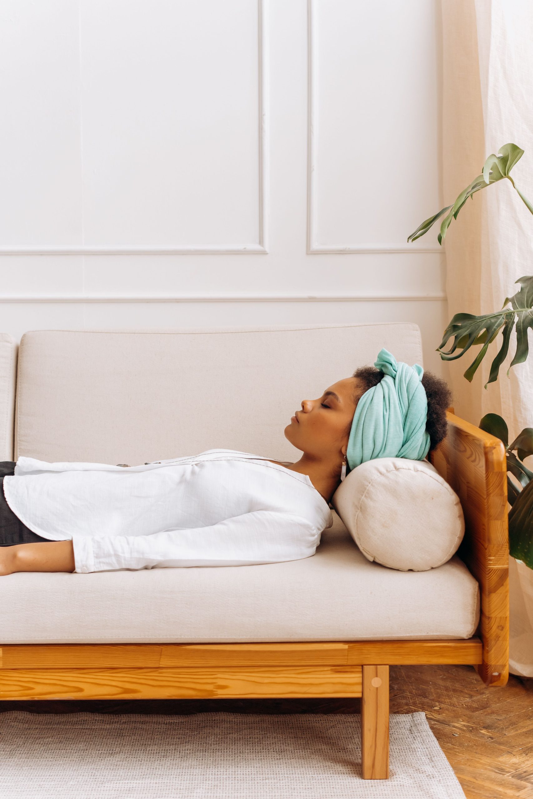 A person sitting quietly in soft light